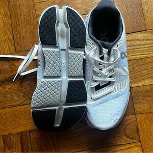 On Running Men’s White and Black Athletic Running Shoes